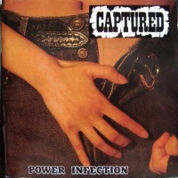 [Captured  Album Cover]